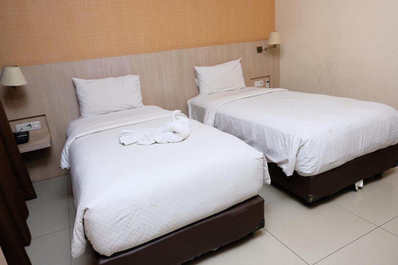 פאלמבאנג Rio City Hotel מראה חיצוני תמונה